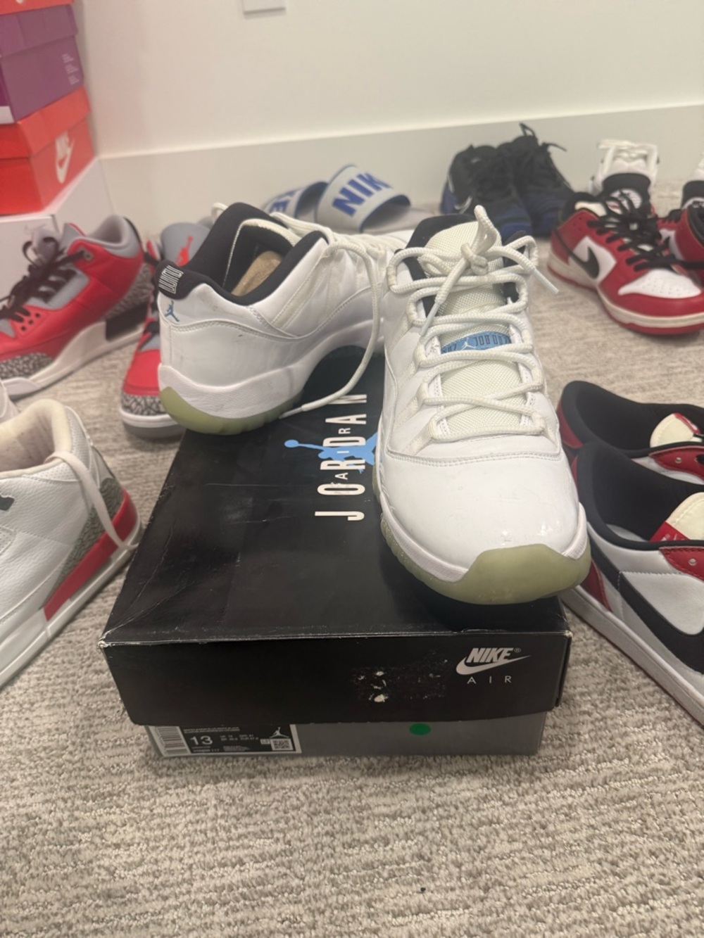 Jordan White Black Low-Top Sneakers with Light Blue Accents